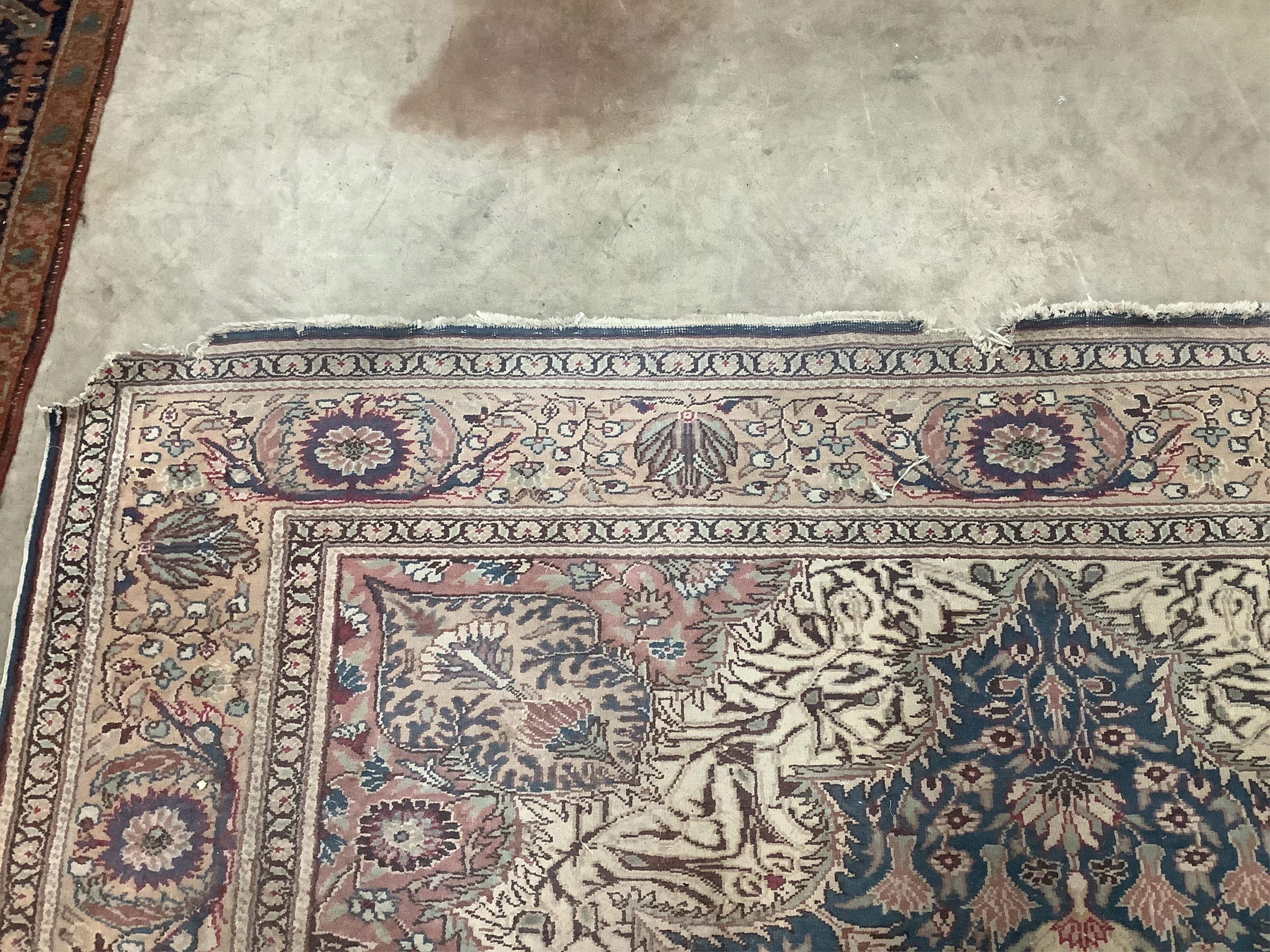 A North West Persian ivory ground carpet, 290 x 200cm. Condition - poor to fair